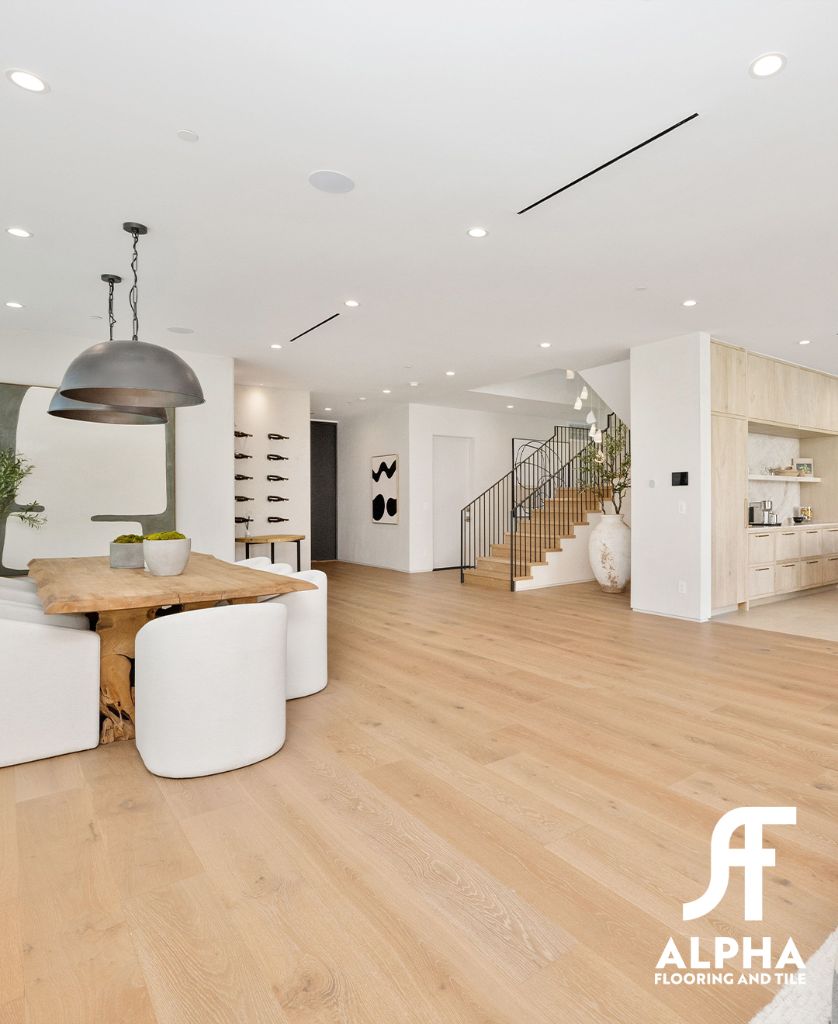 Open-plan living and dining with light oak flooring