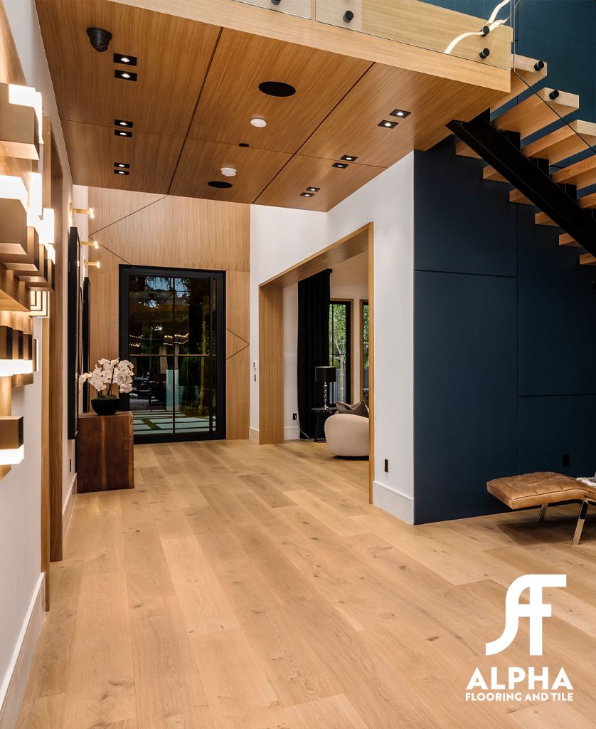 Warm wood hallway with feature staircase